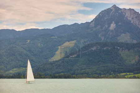 Sailing on Wolfgangsee lake. Salzburgerland. Austrian mountain landscape