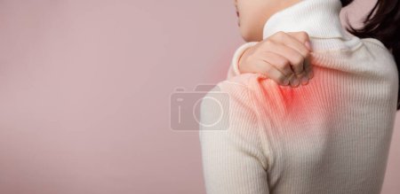 Photo for Young asian woman hold her hand on pain neck and injury ache shoulder stress problem muscle. Office syndrome disease, healthcare concept - Royalty Free Image