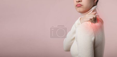 Photo for Young asian woman hold her hand on pain neck and injury ache shoulder stress problem muscle. Office syndrome disease, healthcare concept - Royalty Free Image
