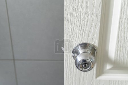 Photo for The door knob is being found that caused the COVID 19 infection. Doorknob lock handle home security close. - Royalty Free Image