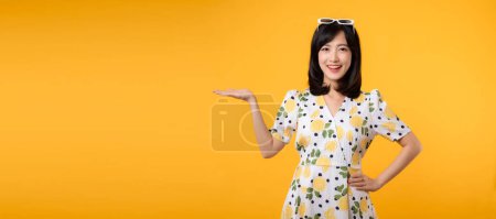 Photo for Portrait young cheerful asian woman happy smile dressing springtime female style fashion isolated on yellow background. attractive pretty model girl posing emotion summertime concept. - Royalty Free Image