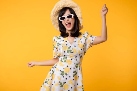 Photo for Portrait young cheerful asian woman happy smile dressing springtime female style fashion and sunglasses isolated on yellow background. attractive pretty model girl posing emotion summertime concept. - Royalty Free Image