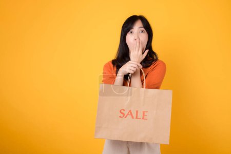 Photo for Discover the excitement of shopping surprises with best deals around. Smiling woman holds bags, reflecting the happiness of finding incredible savings. - Royalty Free Image