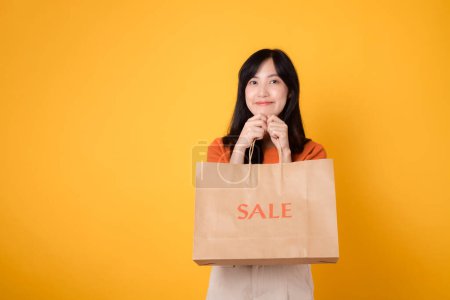 Photo for Experience the joy of a surprising shopping spree with the best deals. Trendy woman presents stylish finds, capturing the excitement of smart purchases. - Royalty Free Image