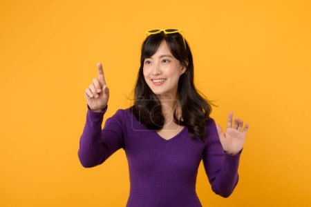 Photo for Young Asian 30s businesswoman wearing purple jumper shirt pointi - Royalty Free Image