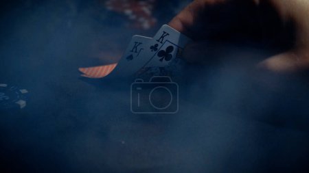 Foto de The player watches art while playing poker. A combination of four aces, four of a kind, winning cards fell out - Imagen libre de derechos