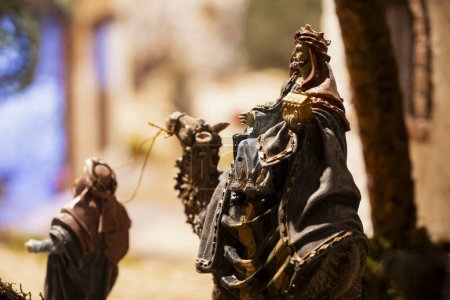 Photo for Figurine of the wise man Melchior on a camel nativity scene figures, in a nativity scene, in Borja, Zaragoza, Spain - Royalty Free Image