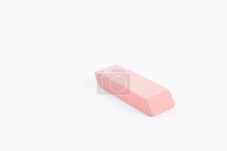 An isolated on white pink eraser for school or office.