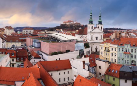 Panorama of Brno skyline with castle Spilberg, main square and cathedral Petrov at dramatic sunset. Czech Republic
