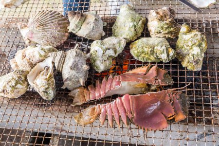 Photo for Sea food barbecue - fresh oyster, scallop and crayfish grill . - Royalty Free Image
