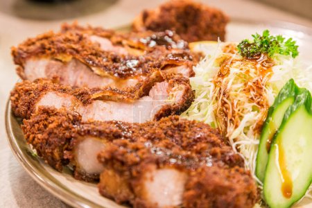 Closeup Japanese deep-fried pork cutlet - Tonkatsu.