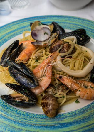 Close up Italian seafood pasta with shrimps, mussels and clams