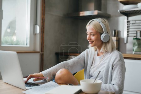 Photo for Woman remote working from her home - Royalty Free Image