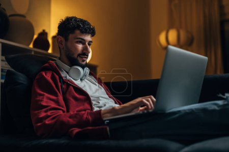Photo for Programer works late at night, remote working - Royalty Free Image