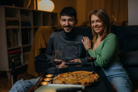 Photo for Beautiful couple enjoys a romantic evening together - Royalty Free Image