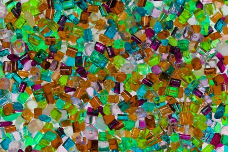 Foto de Varias resinas de polímero plástico de diferentes colores transparentes - Imagen libre de derechos