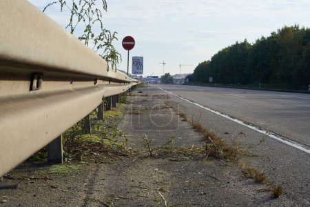 Photo for Empty shabby 8-lane motorway during bridge works - Royalty Free Image
