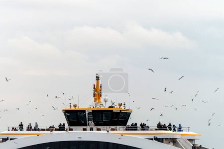 Photo for Close View of Boat Trip Vessel full of Tourists in Istanbul, Turkey - Royalty Free Image