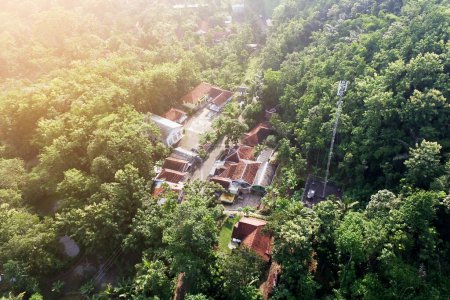 aerial photo with drones, people's homes, roads and forests in the morning