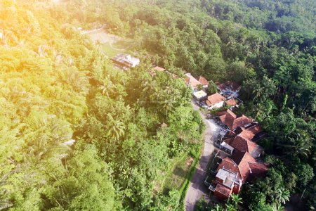 aerial photo with drones, people's homes, roads and forests