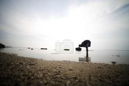 Photo for Blur of people playing on the beach - Royalty Free Image