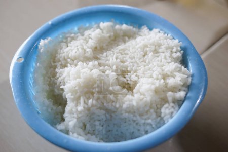warm white rice in a container
