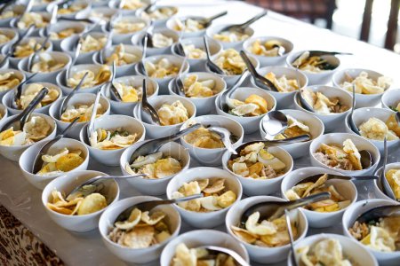 soto ayam is authentic indonesian food. lined up on the dining table ready to be served