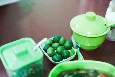 A bowl of green lime or Indonesia Jeruk nipis