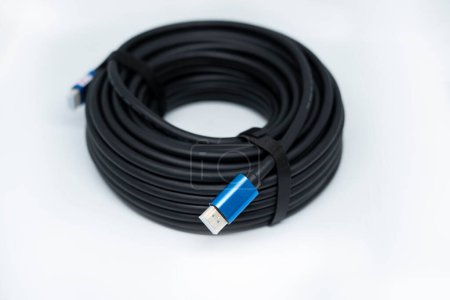 Video cable Display Port to HDMI, 20 meters, black, rolled into a ring, with two gold-plated connectors. Top View. Isolated on white