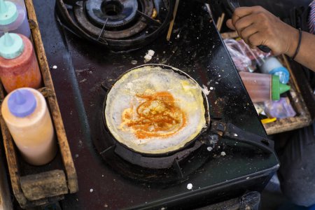 the process of making "cilung" a typical Sundanese street snack made from tapioca flour which is fried briefly and then added with flavoring and chili flour