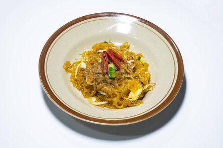 Close up of Mie Glosor or Glossy noodles. noodles derived from sago flour (aci) mixed with turmeric is indeed identical to the city of rain, Bogor, Indonesia.