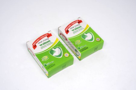Photo for Jakarta, Indonesia. December 28, 2023: ulcer medicine in packaging on the Indonesian market brand waisan Isolated on white background - Royalty Free Image