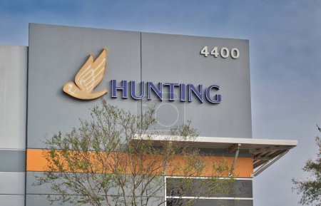 Photo for Houston, Texas USA 02-25-2023: Hunting Energy Services office building facade exterior in Houston, TX. Manufacturer of wellbore drilling components. - Royalty Free Image