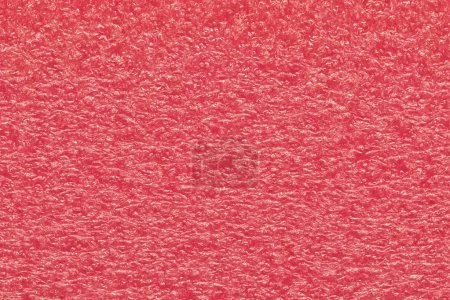 Photo for Melon pink expanded polyethylene foam sample background. EPE beads packing material with macro details, textures and one solid color. - Royalty Free Image