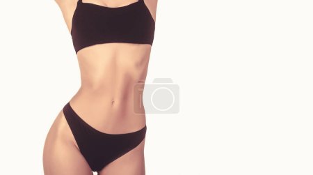 Photo for Woman body in black panties. Woman body shape. Sensual waist. Sexy woman in elegant red underwear. Athletic body, slim waist, sexy girl. Sexy young woman in black lingerie. - Royalty Free Image