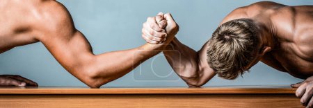 Photo for Two hands. Men measuring forces, arms. Hand wrestling, compete. Hands or arms of man. Arm wrestling. Two men arm wrestling. Rivalry, closeup of male arm wrestling. - Royalty Free Image