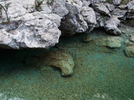 Photo for The Emerald Pools are one of the most spectacular natural attractions in Friuli, they are located in Val Tramontina (Tramonti di Sopra), one of the seven valleys of the Natural Park of the Friulian Dolomites - Royalty Free Image