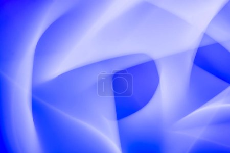 Abstract artwork with smooth, flowing gradients of various shades of blue. The image features layered and overlapping shapes that create a sense of depth and dimension, enhancing its visual appeal.