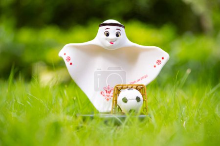Photo for ZHONGSHAN China-November 9,2022:Legend the Bigfoot for The FIFA World Cup - Qatar 2022 on grass at horizontal composition. - Royalty Free Image