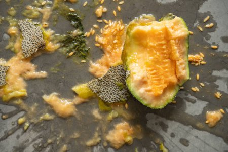 Photo for Top view broken hami melon on the ground horizontal composition - Royalty Free Image