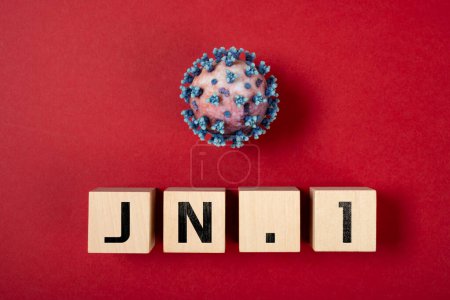 Téléchargez les photos : Variante coronavirus et JN.1 sur fond rouge - en image libre de droit