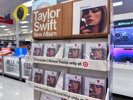 Photo for Minnetonka, Minnesota - October 27, 2022: Kiosk display of Taylor Swift Midnights new album. CD and vinyl records for sale, at a Target store - Royalty Free Image