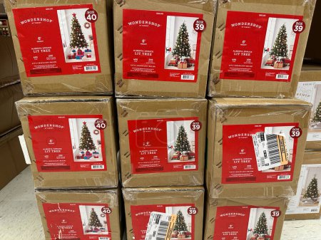 Photo for Plymouth, Minnesota - November 4, 2022: Display of pre-lit Christmas trees from Target store Wondershop, in boxes - Royalty Free Image