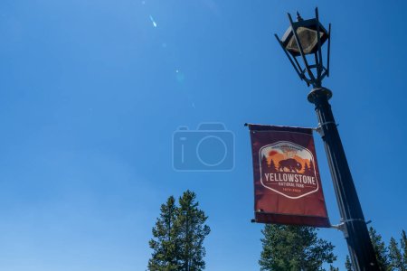 Photo for Wyoming, USA - July 19, 2022: 150th anniversary flag banner celebrating Yellowstone National Park - Royalty Free Image