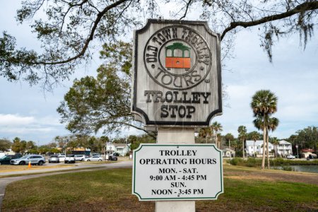 Photo for St. Augustine, Florida - December 31, 2022: Sign noting a designated Old Town Trolley tour stop for tourists exploring the city - Royalty Free Image