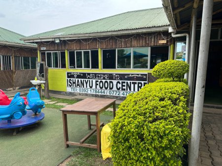 Photo for Mbarara, Uganda - March 25, 2023: Entrance to the Ishanyu Food Centre restaurant, serving local food with a buffet - Royalty Free Image