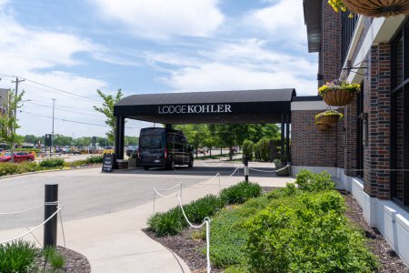 Photo for Green Bay, Wisconsin - June 2, 2023: Lobby entrance for the Lodge Kohler, a fancy hotel across the street from Lambeau Field - Royalty Free Image