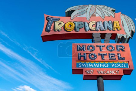 Photo for Tucson, Arizona - December 20, 2023: Retro style neon sign for the Tropicana Motor Hotel and Swimming Pool, at the Miracle Mile area - Royalty Free Image