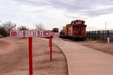 Photo for Winslow, Arizona - December 18, 2023: Sante Fe BNSF train cars on display in a city park in Winslow, Arizona - Royalty Free Image