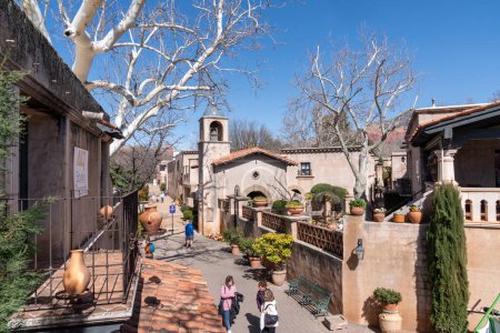 Sedona, Arizona - March 10, 2024: Shoppers browse through the galleries and shops of Tlaquepaque